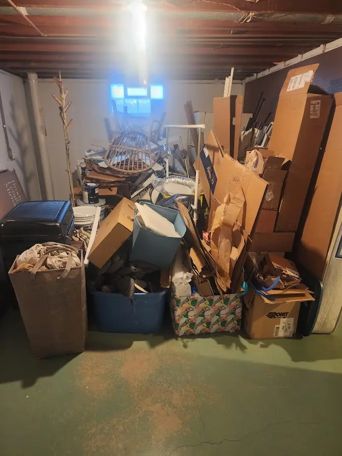 Roll-off dumpster container at job site for 2 Yard Dumpster Rental in South Londonderry